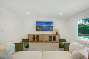 Smart TV, fireplace, table football, computer monitors