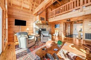 Smart TV, chimenea, reproductor de DVD y biblioteca musical