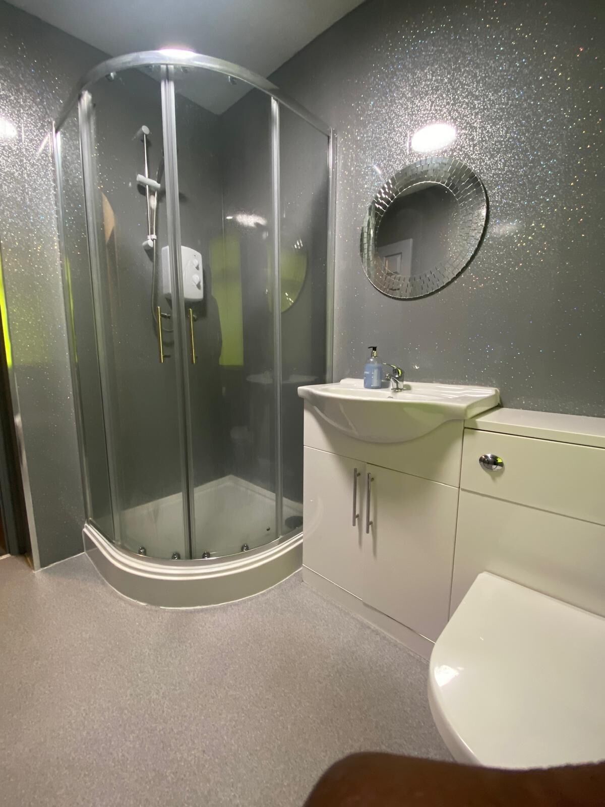 Shower, towels, toilet paper