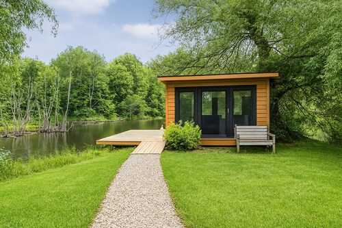 New Remodel on Black River with Hot Tub, Kayaks, Gym, Fireplace, & Game Room!
