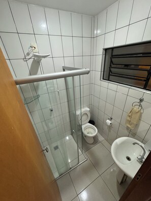 Shower, towels, toilet paper