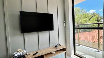 Apartamento | Área de estar | Smart TV 40 polegadas com canais digitais