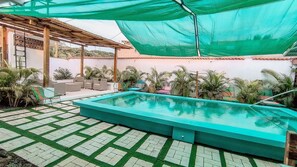 Outdoor pool - Charming 2-bedroom house with WiFi, Pool, and AC in enchanting Monterrico.  (Monterrico)