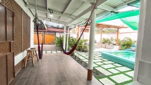 Outdoor pool - Charming 2-bedroom house with WiFi, Pool, and AC in enchanting Monterrico.  (Monterrico)