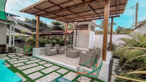 Terrace/patio - Charming 2-bedroom house with WiFi, Pool, and AC in enchanting Monterrico.  (Monterrico)