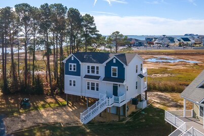 Robert's Retreat | 5BR Marsh Views + Decks, Pools, Golf & Captain's Cove Amenities