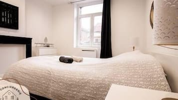 1 slaapkamer, een strijkplank/strijkijzer, wifi, beddengoed