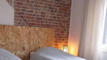 2 slaapkamers, een strijkplank/strijkijzer, wifi, beddengoed