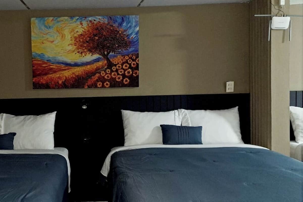 Desk, laptop workspace, free WiFi, bed sheets