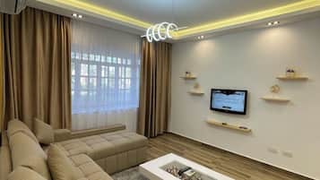 Luxury Apartment | Living room | 43-inch Smart TV with cable channels