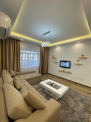 Luxury Apartment | Living room | 43-inch Smart TV with cable channels - Delta Sharm Resort - Sharm El-Sheikh (Sharm El Sheikh)