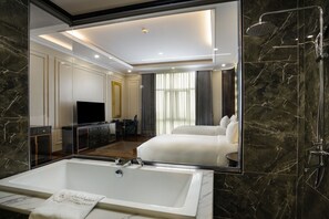 Deluxe Room, 2 Single Beds, Garden View | Bathroom | Combined shower/bathtub, rainfall showerhead, designer toiletries - Adamo Hotel Hung Yen (Yen My)