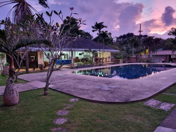 Outdoor pool, open 6:00 AM to 10:00 PM, free pool cabanas, pool loungers
