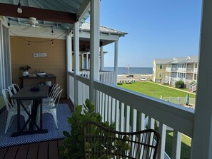 Enjoy al fresco dining on the deck with ocean views.