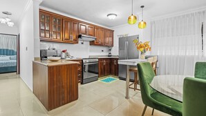 คอมฟอร์ทคอนโด, 2 ห้องนอน, วิวสวนหย่อม, ชั้นบน | บริเวณนั่งเล่น