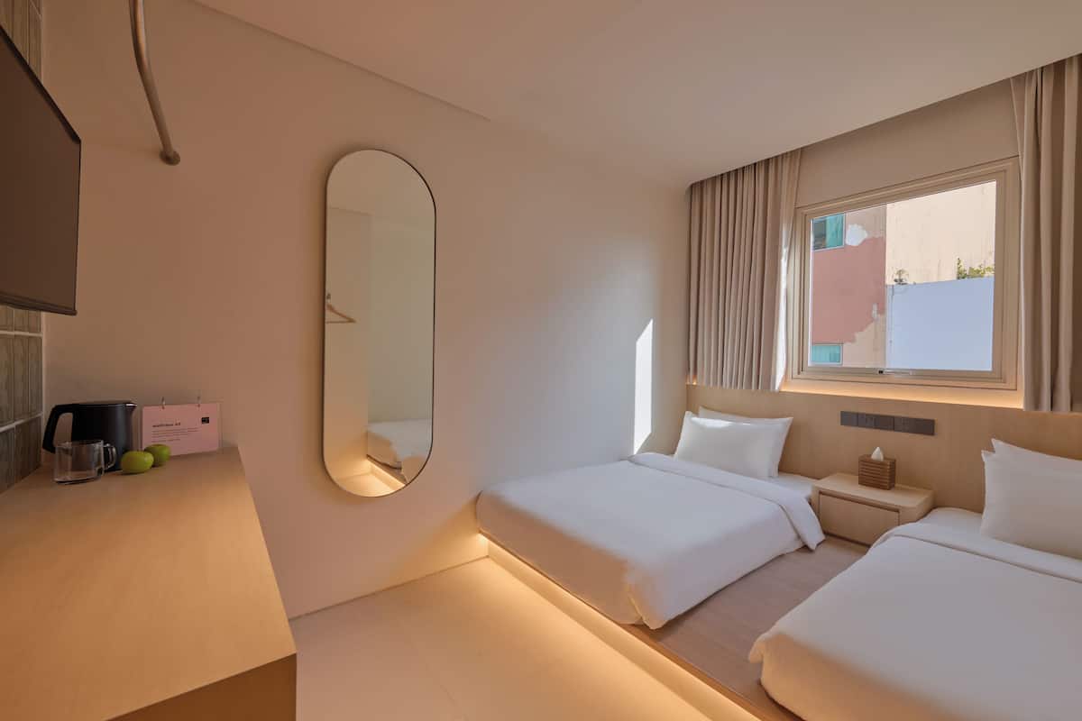 Twin Room, Non Smoking, City View | In-room safe, free WiFi, bed sheets