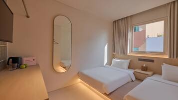 Twin Room, Non Smoking, City View | In-room safe, free WiFi, bed sheets