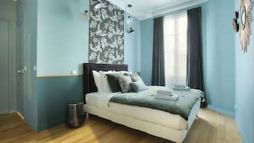 Apartment | Laptop workspace, iron/ironing board, bed sheets