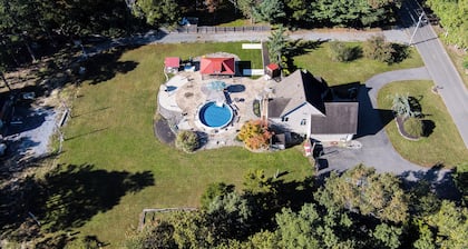 ClubDivot - A Modern Farm Style Home with Pool and Backyard Bar