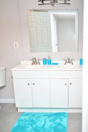 Hair dryer, bidet, towels, soap