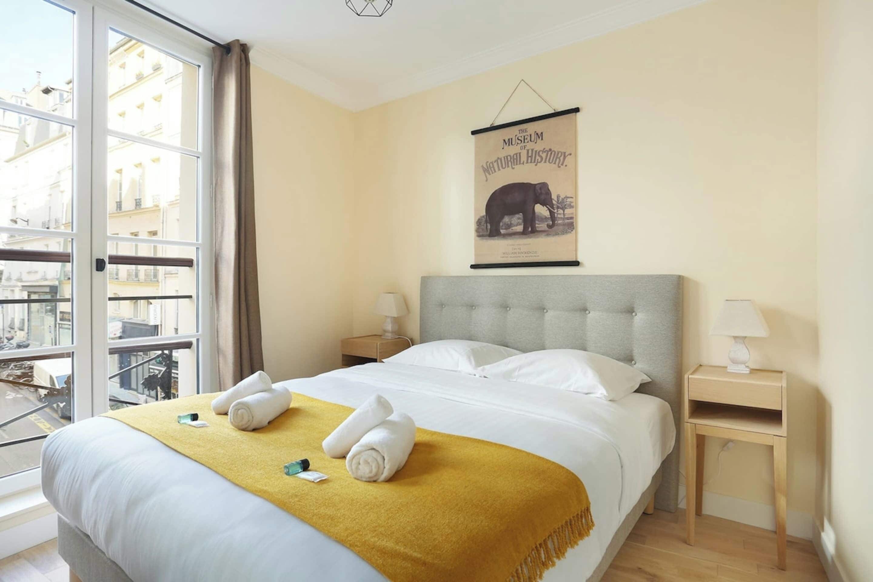 Apartment | Laptop workspace, iron/ironing board, bed sheets