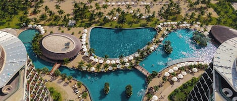 3 outdoor pools, pool umbrellas