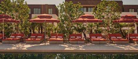 Outdoor pool, open 7:00 AM to 10:00 PM, free pool cabanas