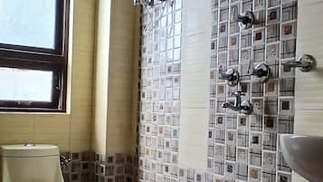 Shower, free toiletries, slippers, towels