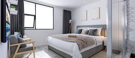 Una camera da letto moderna con un letto grande, una scrivania con una sedia, una TV a parete e una finestra con tende.
