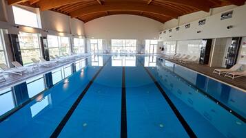 Indoor pool, seasonal outdoor pool, pool umbrellas, sun loungers