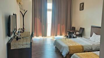 Standard Twin Room, Balcony, Beach View | Laptop workspace, free WiFi