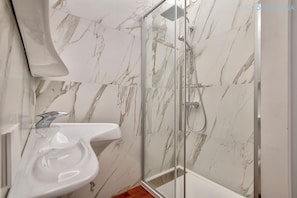 Shower, jetted bath, hair dryer, bidet