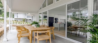 Resort style living with pool, tennis court and beach