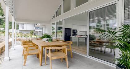 Resort style living with pool, tennis court and beach