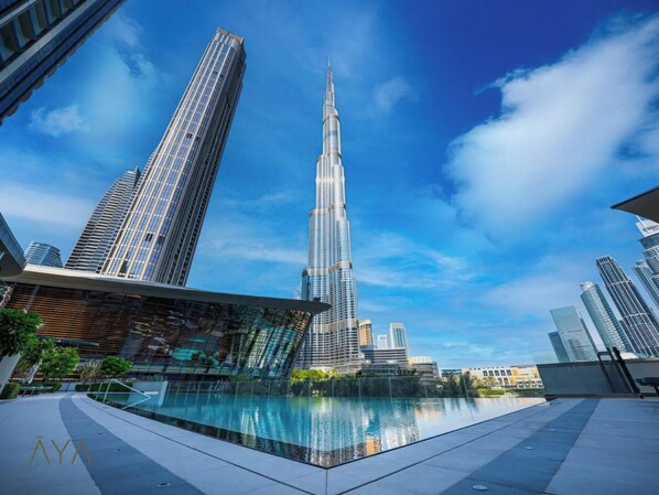 Outdoor pool - Downtown Luxe 1BR Vibes at Grande (Dubai)