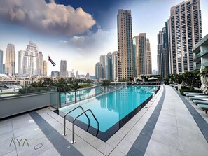 Outdoor pool - Downtown Luxe 1BR Vibes at Grande (Dubai)