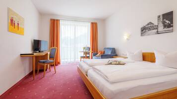 Een kluis op de kamer, verduisterende gordijnen, gratis wifi