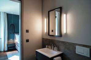 Deluxe Condo, Balcony | Bathroom | Separate bathtub and shower, hair dryer, towels, soap - Andermatt Arve Relax  (Andermatt)