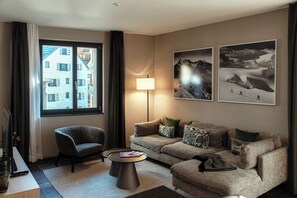 Deluxe Condo, Balcony | Living area | 32-inch flat-screen TV with satellite channels - Andermatt Arve Relax (Andermatt)