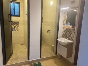 Shower, hair dryer, towels, soap
