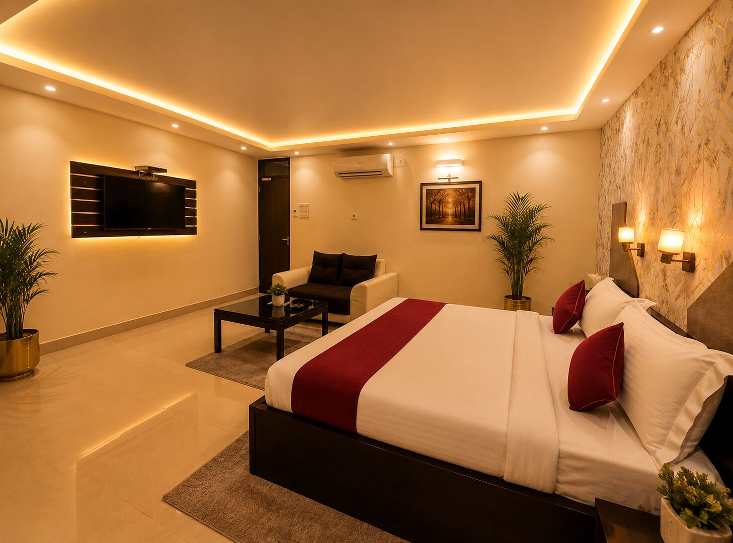A modern bedroom with a large bed, a sofa, a coffee table, and a TV.
