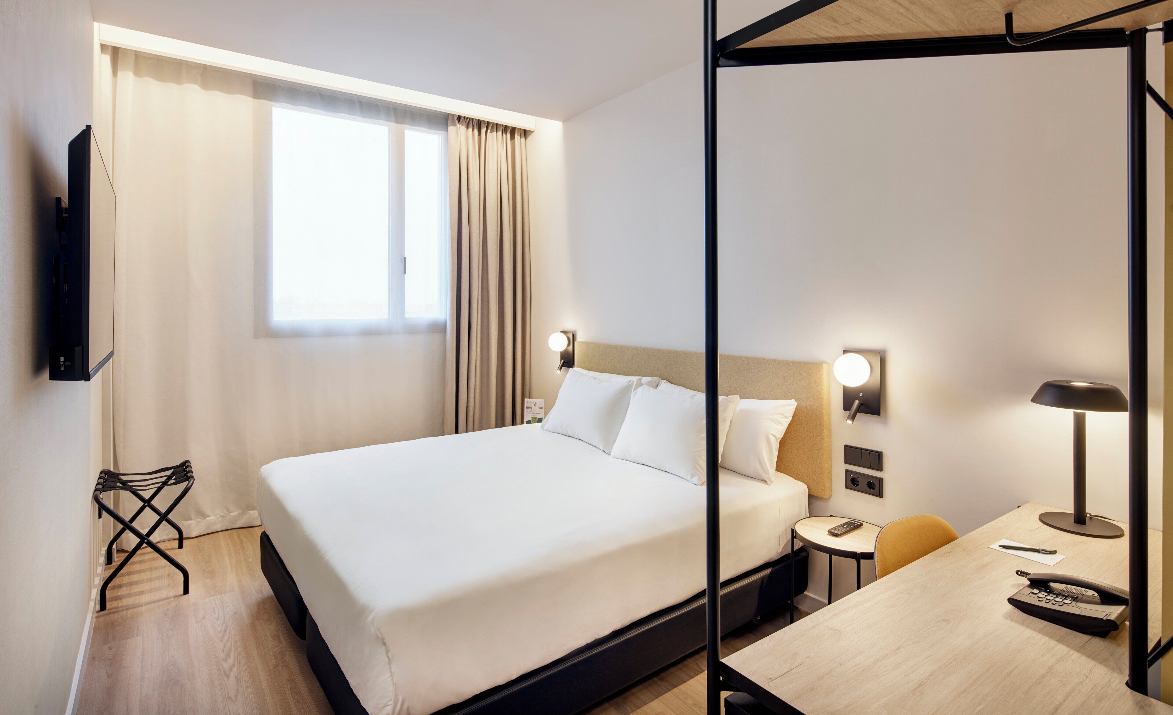 Classic Double Room | Minibar, in-room safe, desk, laptop workspace