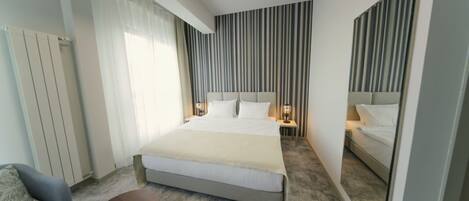 Quarto standard, 1 cama Queen | Roupas de cama premium