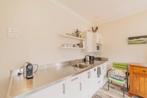 Microwave, dishwasher, cookware/dishes/utensils