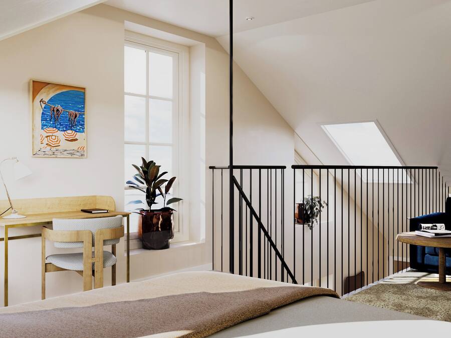 A modern loft bedroom with a sloped ceiling, a desk with a chair, a bed, a small table with a plant, and a painting on the wall.