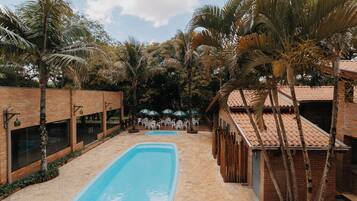 2 outdoor pools, open 9:30 AM to 10:30 PM, pool umbrellas