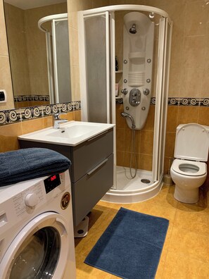 Hair dryer, towels, soap, toilet paper