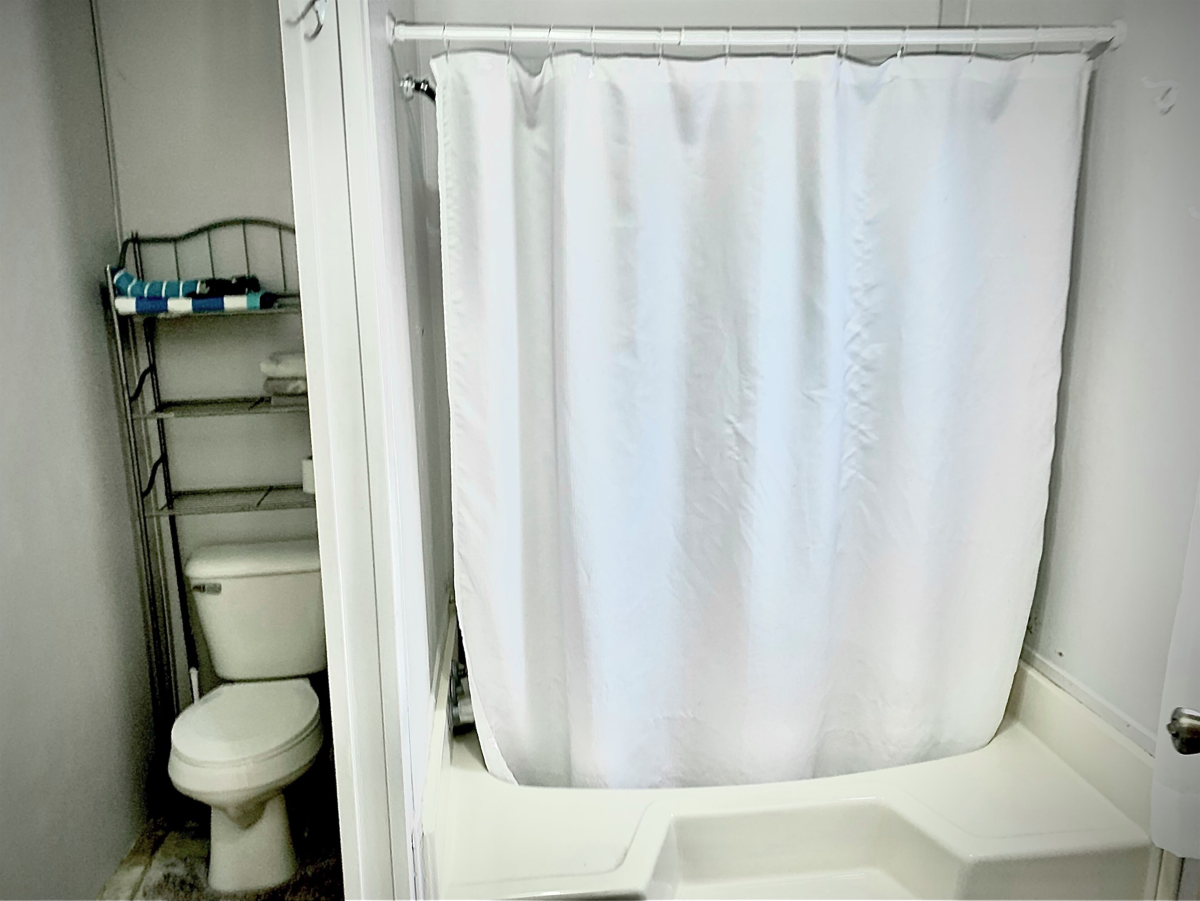 Hair dryer, towels, soap, shampoo