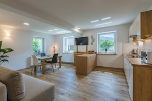 Comfort Apartment | Living area | 43-inch LED TV with cable channels - Domačija Log v Bohinju (Bohinj)