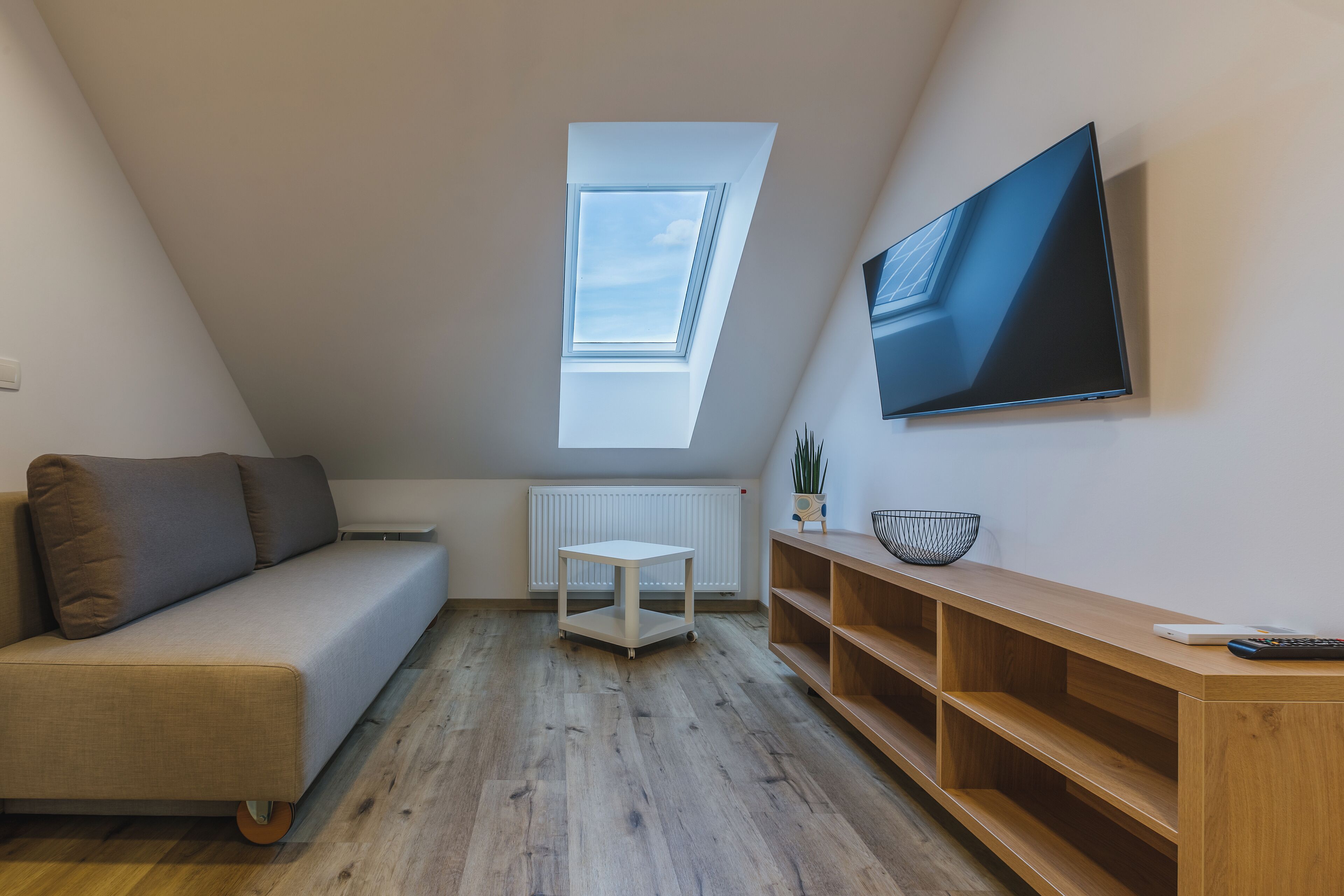 Classic Apartment, Balcony | Living area | 43-inch LED TV with cable channels